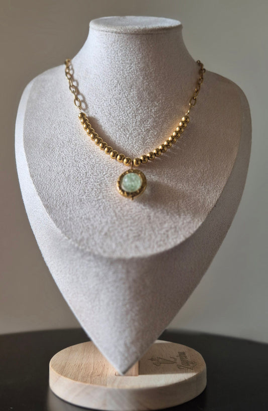 Collier acier doré avec pendentif