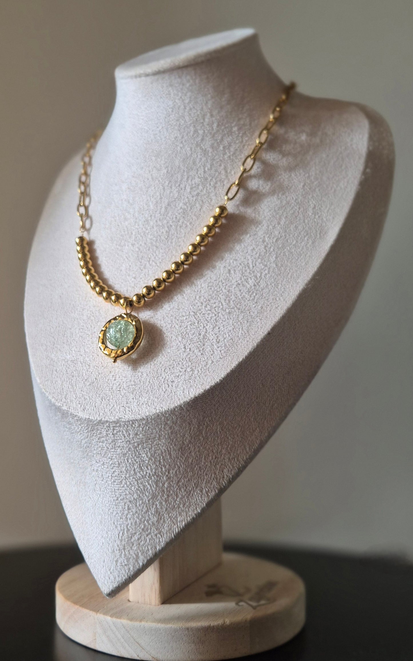 Collier acier doré avec pendentif